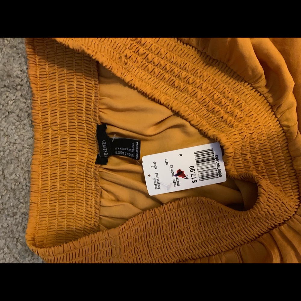 Never worn off the shoulder yellow mustard dress.